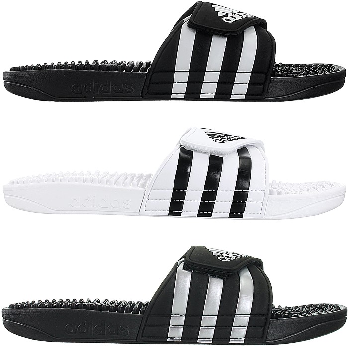 white and silver adidas slides
